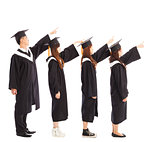 graduate students standing a row and pointing the same 