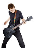 Man on a white background. Performer with an electric guitar