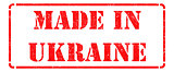 Made in Ukraine - inscription on Red Rubber Stamp.