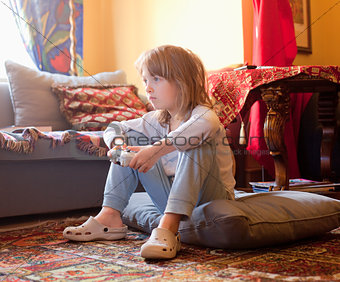 Boy Playing Console Game 