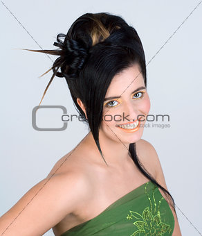 Young Woman with Colorful Makeup and Fancy Hairstyle
