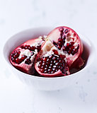 Pieces of Pomegranate in a White Bowl