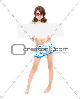 joy sunshine woman standing and holding a board 