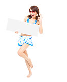 happy sunshine woman holding a board and ok gesture