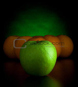 oranges and apple like billiard balls