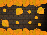 Leaves and brick wall