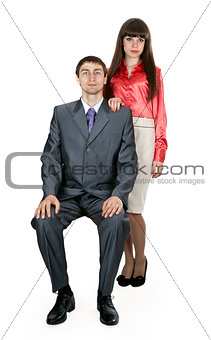 married couple in business attire in the studio