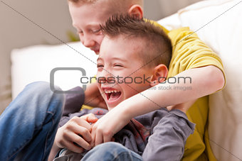 two little boys laughing