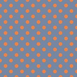 Tile vector pattern with orange polka dots on grey blue background