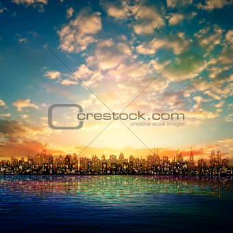 abstract nature background with panorama of city sunrise