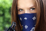 Gun Bandit Woman in Bandanna Holds Black Revolver