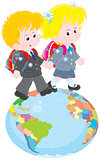 Schoolchildren going on a globe
