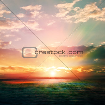 abstract nature background with sunrise and ocean