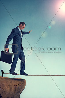 balancing businessman