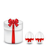 Easter gift box with red bow and eggs