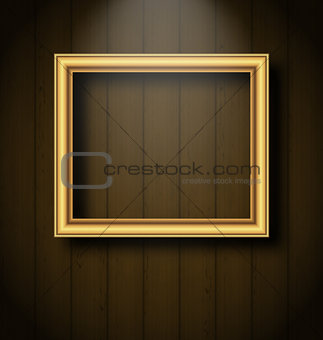 Vintage picture frame on wooden wall