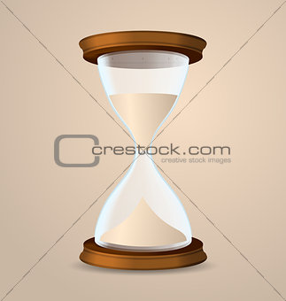 Vintage hourglass isolated on beige background