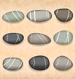 Sea pebbles collection on sand background