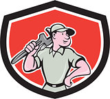 Plumber Holding Wrench Shield Cartoon