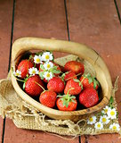 basket of fresh ripe strawberries - summer berries rustic style