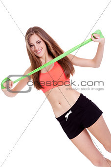 athletic young woman doing workout with physio tape latex tape