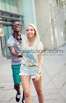 happy young couple have fun in the city summertime 
