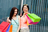 two attractive young girls women on shopping tour