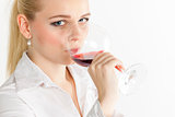 portrait of young woman drinking red wine
