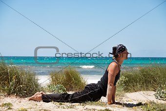 adult healthy man doing pilates yoga exercise 