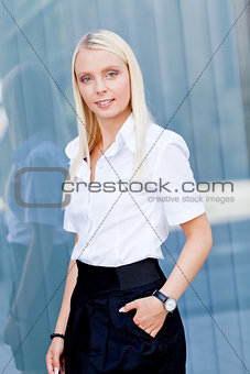 attractive young successful smiling business woman standing outdoor 