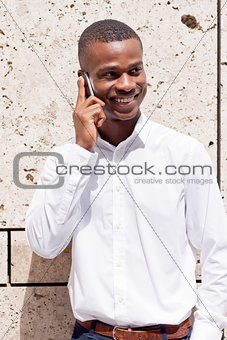 young successfil african businessman with mobilephone 