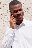 young successfil african businessman with mobilephone 