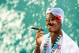 Portrait of cuban black woman smoking cigar