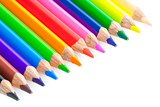 colorful pencils in a corner on white background