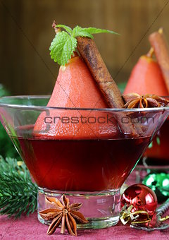 pears cooked in wine with spices (cinnamon and anise)