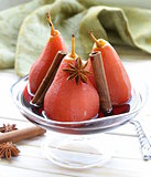 pears cooked in wine with spices (cinnamon and anise)