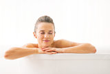 Portrait of relaxed young woman in bathtub