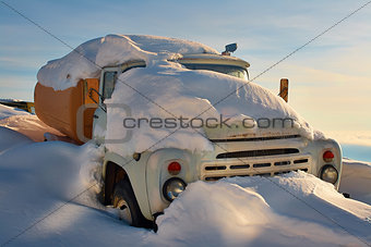 A truck filled with snow