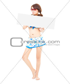 funny sunshine girl standing and holding a board 