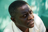 Portrait of middle aged african man staring the camera