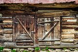 Detail of old wooden textured and weathered barn door