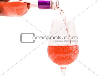 Pink Wine Pouring into Glass