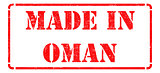 Made in Oman - inscription on Red Rubber Stamp.