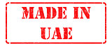 Made in UAE - inscription on Red Rubber Stamp.