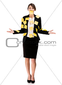 Business woman with yellow paper notes