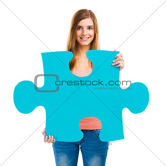 Woman holding a puzzle