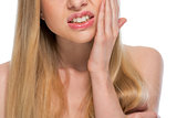 Closeup on teenager with toothache