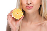 Closeup on teenager showing lemon