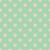 Tile pattern with cupcakes on green background