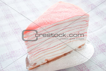 Close up delicious pink crepe cake 